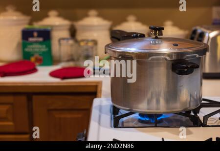 Canning venison in a northern Wisconsin kitchen. Stock Photo