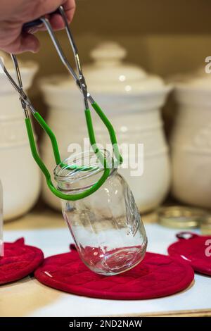 Canning venison in a northern Wisconsin kitchen. Stock Photo