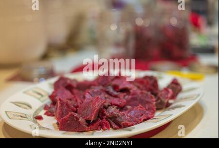 Canning venison in a northern Wisconsin kitchen. Stock Photo