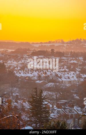 Sunset on a snowy winter evening from windmill hill gravesend looking towards the A2 and Swanscombe cut. Stock Photo