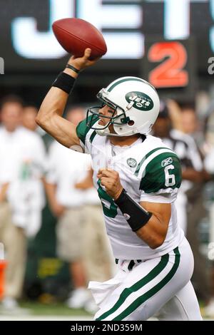 New York Jets Mark Sanchez takes off his helmet after greeting