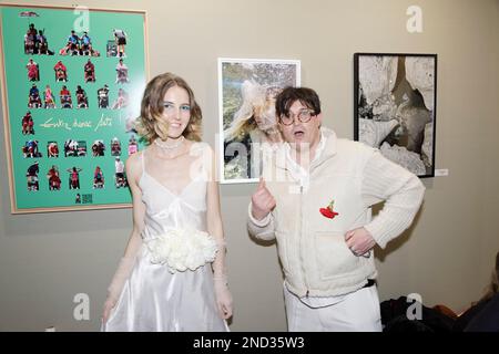 Paris, France. 14th Feb, 2023. Christopher Lavenair and his model Julie Gintowt-Dziewaltowski pose in front of her work during the press preview. Stock Photo