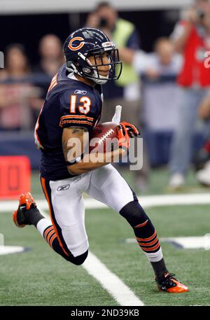 Chicago Bears wide receiver Johnny Knox (R) is tackled by Atlanta Falcons  defensive back Thomas DeCoud (28) and defensive back Dunta Robinson (23)  after a 25-yard reception during the first quarter at