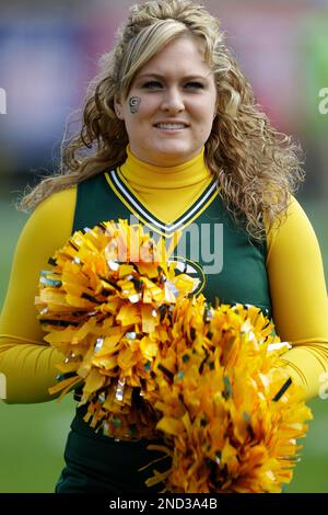 A Green Bay Packers cheerleader is seen before an NFL football