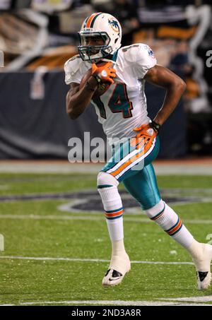 November 28, 2010; Oakland, CA, USA; Miami Dolphins wide receiver Marlon  Moore (14) warms up before the game against the Oakland Raiders at  Oakland-Alameda County Coliseum. Miami defeated Oakland 33-17 Stock Photo -  Alamy