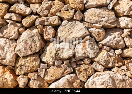 Loosely Stacked Stone Wall Background Stock Photo