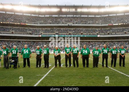 Former Philadelphia Eagles players participate in a ceremony