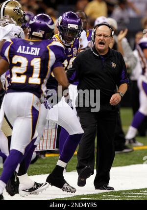 Minnesota Vikings running back Bill Brown, left, has his hand out to  congratulate quarterback Joe Kapp after Kapp scored his first touchdown to  defeat of the Cleveland Browns, 27-7 for the NFL