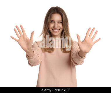 Woman showing number ten with her hands on white background Stock Photo