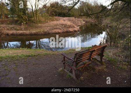 The bench where Nicola Bulley's phone was found, on the banks of the River Wyre in St Michael's on Wyre, Lancashire, as police continue their search for Nicola Bulley, 45, who vanished on January 27 while walking her springer spaniel Willow shortly after dropping her daughters, aged six and nine, at school. Picture date: Wednesday February 15, 2023. Stock Photo