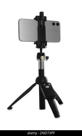 Smartphone fixed to tripod on white background Stock Photo