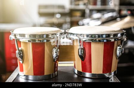 Colorful bongos drums in recording studio Stock Photo
