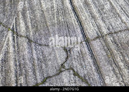 WA22975-00...WASHINGTON - Old, cracked concrete at West Point Lighthouse in Seattle's Discovery City Park. Stock Photo