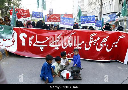 Members of Pakistan Markazi Muslim League (Women Wing) are holding protest demonstration against IMF Policies and massive unemployment, increasing price of daily use products and inflation price hiking, at Karachi press club on Wednesday, February 15, 2023. Stock Photo