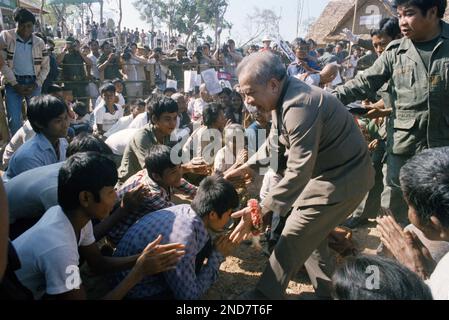 Cambodian Prince Norodom Sihanouk greets Khmer Rouge troopers at their ...