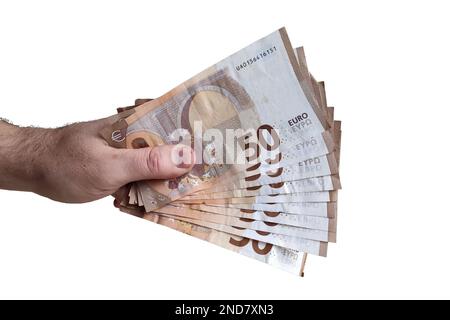Caucasian male hand holding 50 euros banknotes on white background Stock Photo