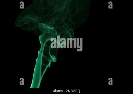 Abstract green smoke on black background. Stock Photo