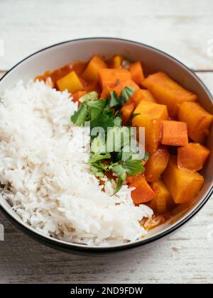 Indian Kohlrabi Stew with carrots, potatoes and crushed tomatoes. Stock Photo