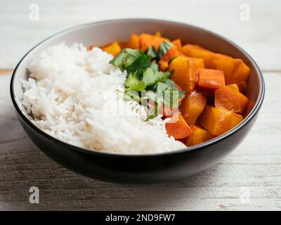 Indian Kohlrabi Stew with carrots, potatoes and crushed tomatoes. Stock Photo