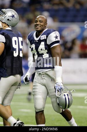 Dallas Cowboys outside linebacker DeMarcus Ware (94) celebrates a good  defensive play in the second half against the Chicago Bears at Cowboys  Stadium in Arlington, Texas, Monday, October 1, 2012. (Photo by