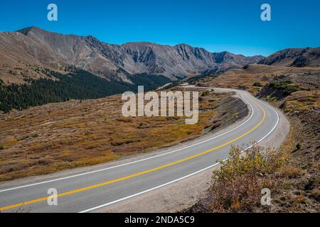 A view of the winding road beneath Loveland Pass in Colorado as tourists take in the spectacular views. Stock Photo