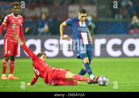 Leon GORETZKA, FCB 8  compete for the ball, tackling, duel, header, zweikampf, action, fight against Achraf Hakimi, PSG 2  in the eighth finals match   PARIS SG - FC BAYERN MUENCHEN  of football UEFA Champions League, match  in season 2022/2023 in Paris, Feb 14, 2022.  Achtelfinale, FCB, Munich, PSG © Peter Schatz / Alamy Live News Stock Photo