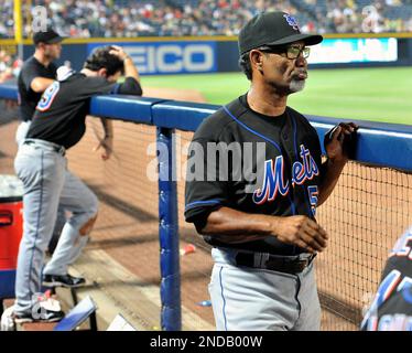 New York Mets manager Jerry Manuel looks on before facing the Colorado  Rockies in the first inning of a Major League baseball game in Denver on  Friday, June 20, 2008. (AP Photo/David