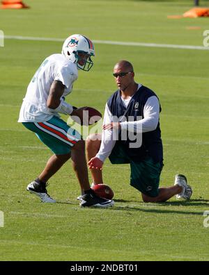 Miami Dolphins quarterback Pat White is taken off the field after a brutal  hit leaves him unconscious on the field for eight minutes. White was taken  to the hospital for further evaluations.