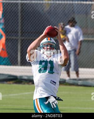 Miami Dolphins tight end Joey Haynos sits on the bench during an NFL  football game between the New York Jets and the Miami Dolphins Tuesday,  Oct. 13, 2009 in Miami. (AP Photo/Wilfredo