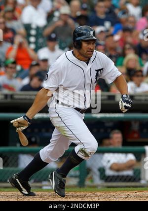 Detroit Tigers' Johnny Damon hits a two-run home run in the 11th