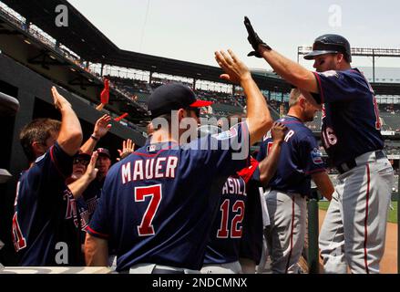 Minnesota Twins' Jason Kubel (16) celebrates his grand slam off