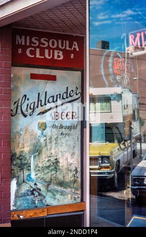 Sign advertising Highlander Beer at the entrance of the Missoula Club sports bar in downtown Missoula, Montana.  Highlander Beer has been brewed local Stock Photo