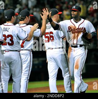 Jason Heyward #22 of the Atlanta Braves gets congratulated by