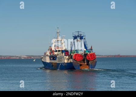 Saldanha Bay, west coast, South Africa. 2023. A fishing trawler leaving the port at Saldanha on the west coast Stock Photo