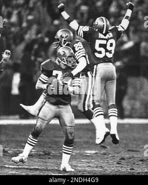 San Francisco 49ers Willie Harper leaps in jubilation as Jim Stuckey comes  up with a Danny White fumble to end the final drive in the NFC Championship  game on Sunday, Jan. 10,