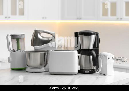 Kitchen appliances. Blender, toaster, coffee machine, meat ginder, microwave  oven and kettle. 3d Stock Photo - Alamy