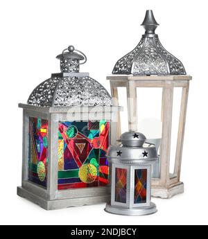 Different decorative Arabic lanterns on white background Stock Photo