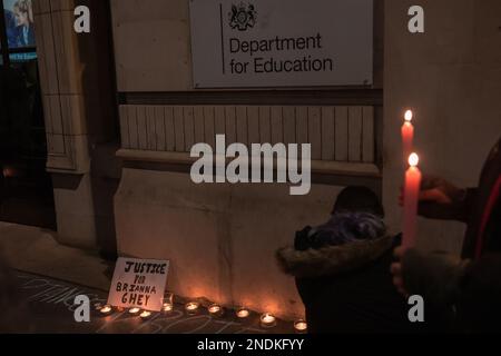 London, UK. 15 February, 2023. Transgender people and supporters attend a candlelit vigil for transgender teenager Brianna Ghey held outside the Department for Education. 16-year-old Brianna Ghey was found stabbed to death in a park in Warrington on 11 February and a boy and a girl, both aged 15, have since been charged by Cheshire Police with her murder. Her case is also being investigated as a possible hate crime. Credit: Mark Kerrison/Alamy Live News Stock Photo