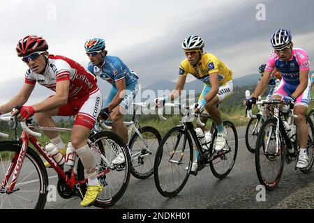 Astana s Alberto Contador of Spain right pedals ahead Silence