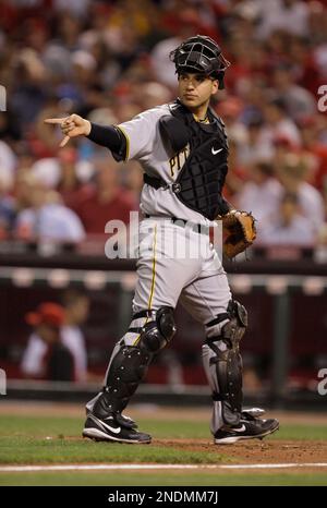 St. Louis Cardinals catcher Yadier Molina throws the baseball to first base  after a bunt by Pittsburgh Pirates Jason Jaramillo in the fourth inning at  Busch Stadium in St. Louis on May