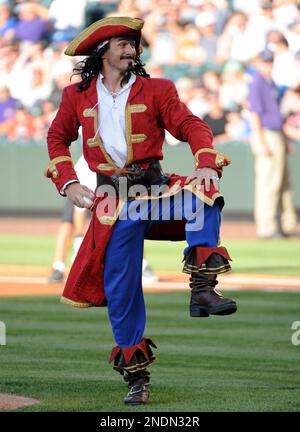 COMMERCIAL IMAGE ** In this photograph taken by AP Images for Captain Morgan,  Captain Morgan and the Morganettes pose with actor James Denton during 2010  MLB All Star Game festivities in