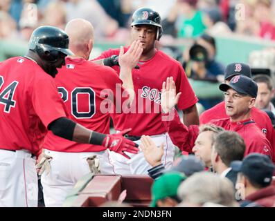 Former baseball player Adrian Beltre, left, greets former teammate