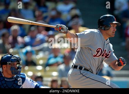Detroit Tigers' Johnny Damon hits a two-run home run in the 11th