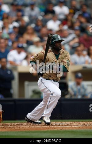 San Diego Padres Tony Gwynn Jr. takes a swing at a pitch from Atlanta  Braves starting pitcher Jair Jurrjens during the Padres opening day win  over the Braves 17-2 at Petco Park