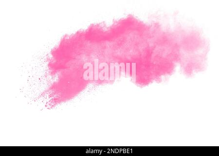 Pink dust particles splash on white background.Pink powder splash. Stock Photo