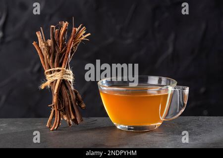 Organic sarsaparilla medicinal hot drink - Smilax aspera Stock Photo