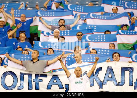 Saudi Arabia's Al Hilal soccer team players celebrate their trophy of the  AFC Champions League 2021 after the team beats South Korea's Pohang  Steelers 2-0 during their final soccermatch at the King