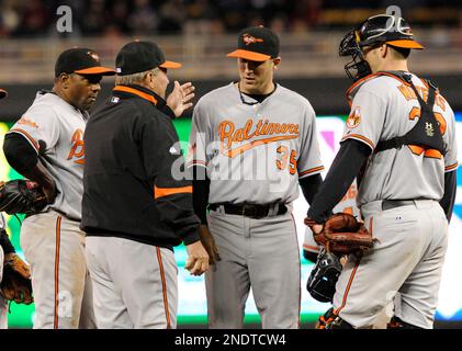 Chicago White Sox's Joe Crede, left, gets a cleat to the neck as Baltimore  Orioles' Miguel Tejada completes a double play that caught Crede and Ross  Gload out in the fifth inning