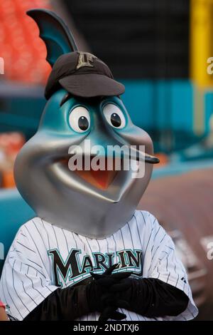 Miami Marlins mascot Billy the Marlin uses a broom to signify a sweep of  the three-game series against the Colorado Rockies after the Marlins beat  the Rockies 3-2 during a baseball game