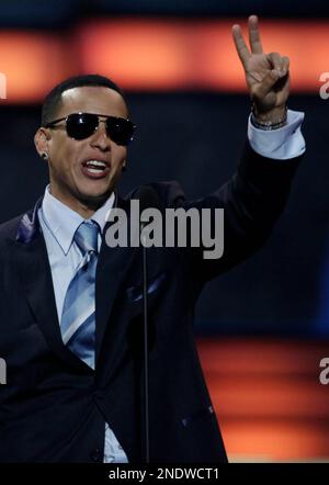 Daddy Yankee celebrates winning the urban genre artist of the year award at  the Premio Lo Nuestro award show, at the American Airlines Arena in Miami,  Florida on February 23, 2006 Stock